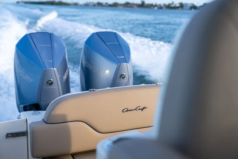 Slide: The Image of 2026 Chris-Craft Catalina 28 with dual Mercury engines cruising on open water. - 3