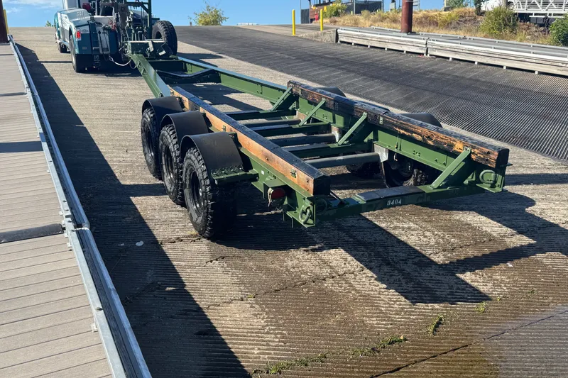 Slide: The Image of Boat trailer on ramp, Zodiac Milpro Hurricane 2004, ready for loading. - 38