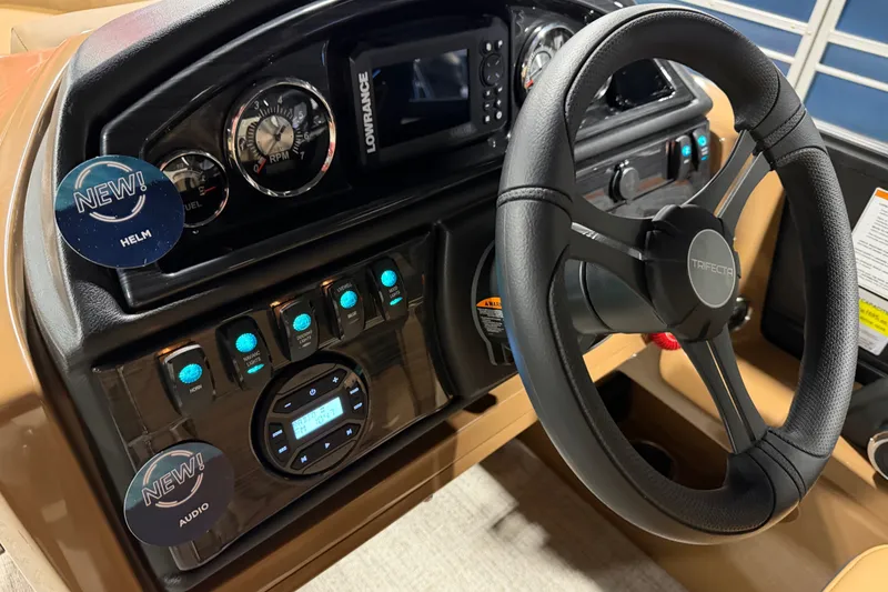 Slide: The Image of Dashboard of 2027 Trifecta 24 RFLE boat with steering wheel and control panel. - 16