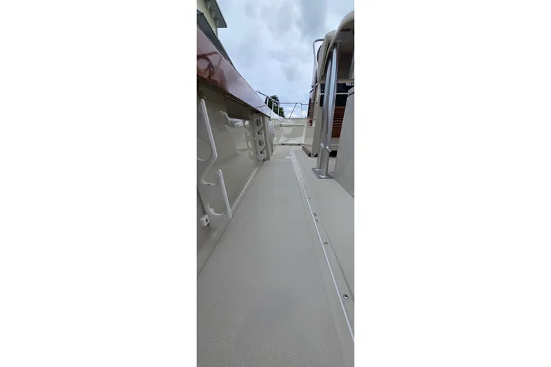 Slide: The Image of 1986 Boston Whaler Outrage 20 boat interior, showcasing sleek design and sturdy construction. - 17