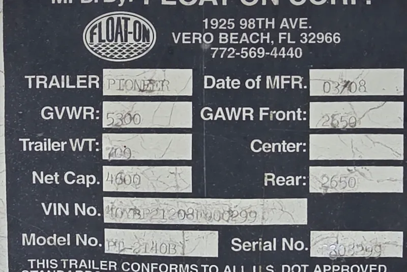 Slide: The Image of Label for Float-On trailer with specifications, including GVWR 5300, VIN, and contact details. - 23