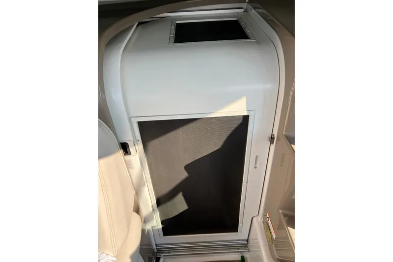 Slide: The Image of Interior cabin door of 2003 Four Winns 298 Vista boat, featuring sleek design. - 14