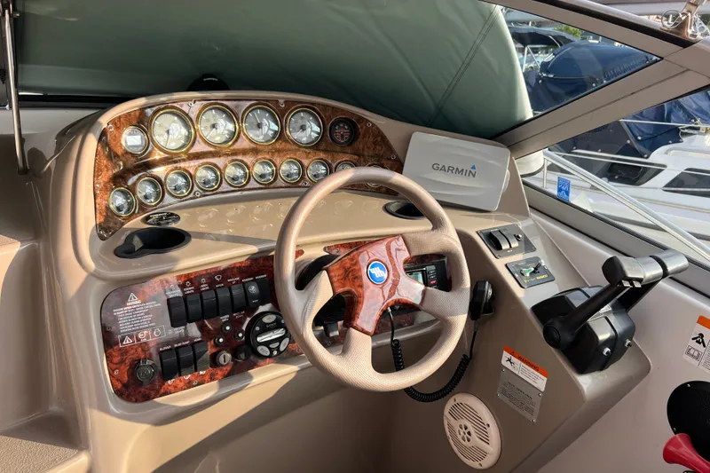 Slide: The Image of Helm of 2003 Four Winns 298 Vista boat with Garmin navigation system. - 1