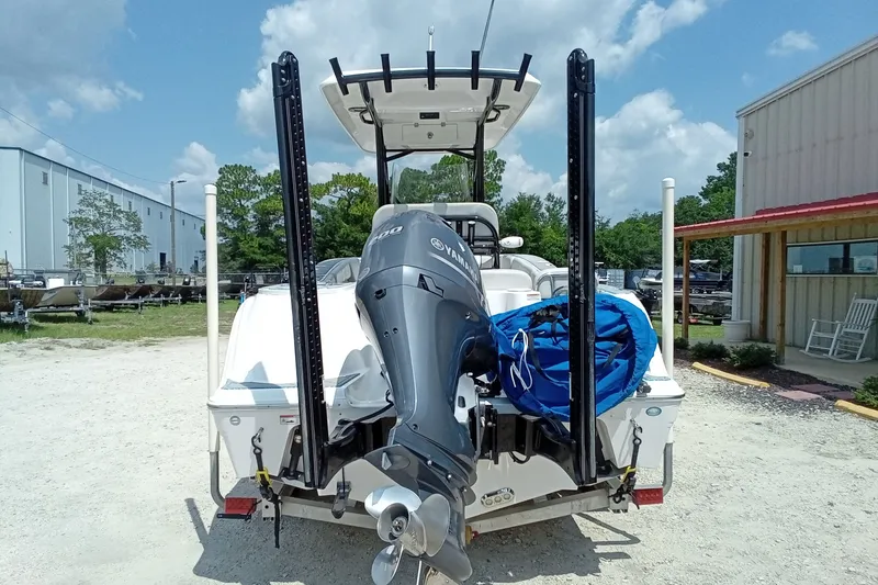 Slide: The Image of 2022 Sea Fox 228 Commander boat with Yamaha outboard motor, parked outdoors. - 43