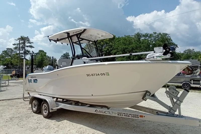 Slide: The Image of 2022 Sea Fox 228 Commander boat on trailer under cloudy sky. - 41