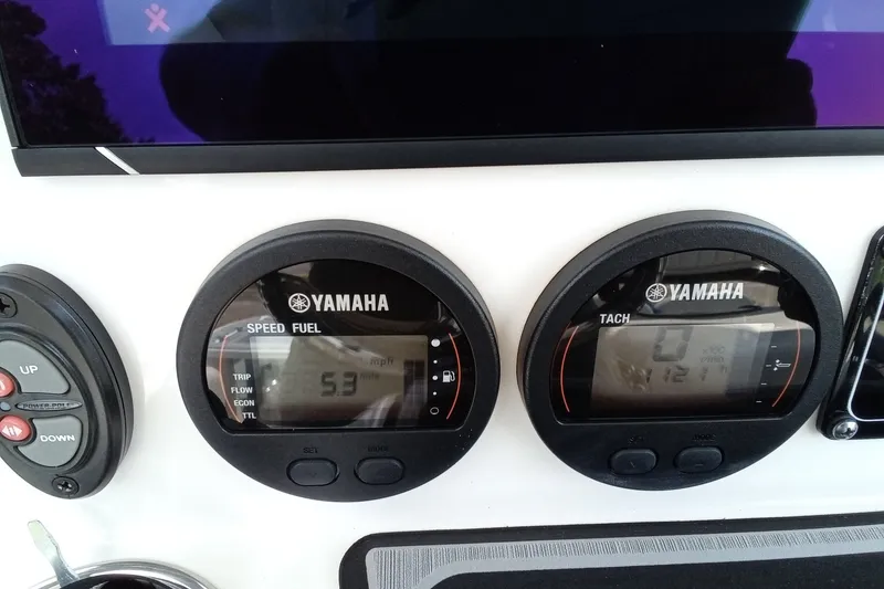 Slide: The Image of Yamaha gauges on 2022 Sea Fox 228 Commander boat dashboard, displaying speed and tachometer. - 31