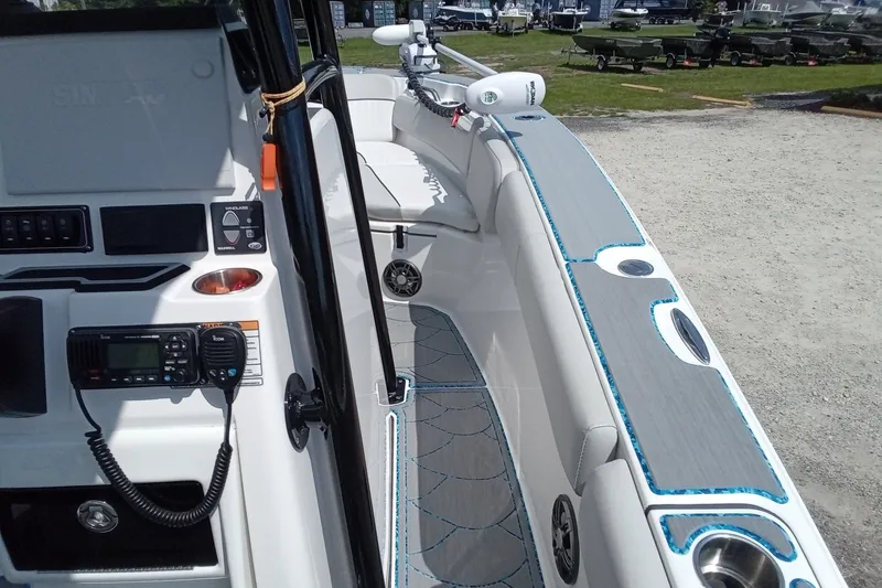 Slide: The Image of 2022 Sea Fox 228 Commander boat interior with modern controls and seating. - 25