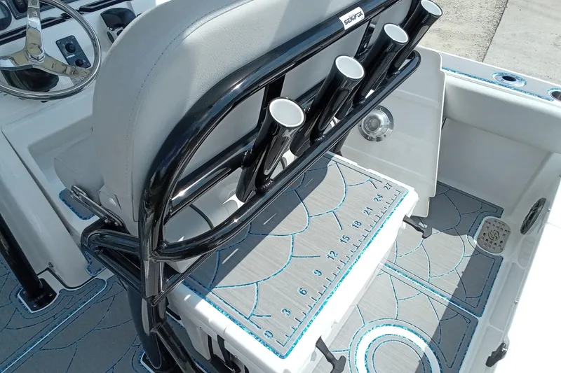 Slide: The Image of 2022 Sea Fox 228 Commander boat interior with rod holders and measuring board. - 20