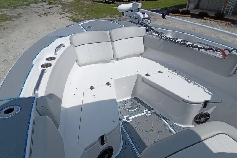 Slide: The Image of 2022 Sea Fox 228 Commander boat interior with seating and cup holders. - 11
