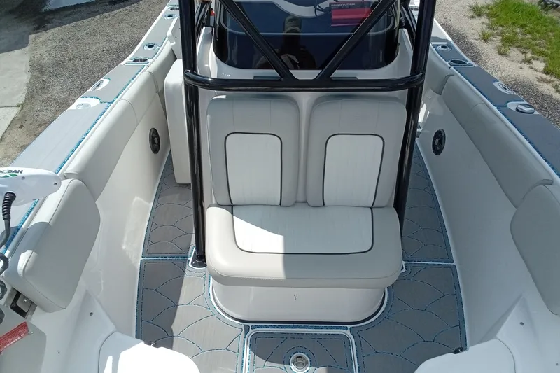 Slide: The Image of 2022 Sea Fox 228 Commander boat interior with cushioned seating and modern design. - 15