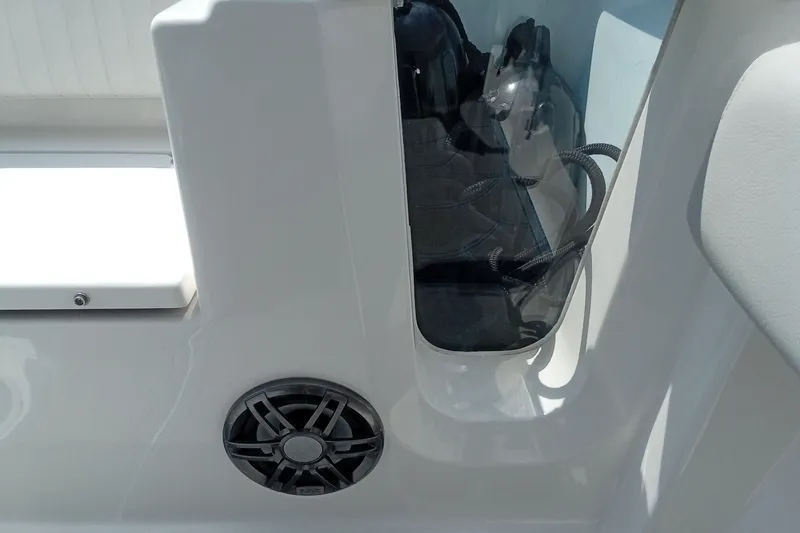 Slide: The Image of 2022 Sea Fox 228 Commander boat interior with speaker and storage compartment. - 4
