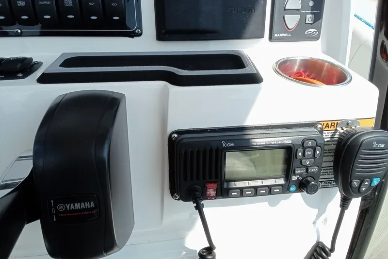 Slide: The Image of Control panel of 2022 Sea Fox 228 Commander with Yamaha and Icom equipment. - 10