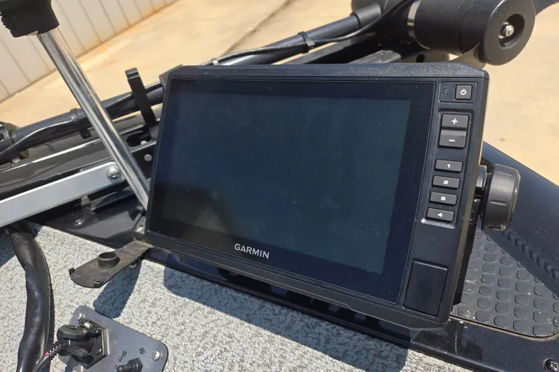 Slide: The Image of Garmin fishfinder on 2017 Tracker Pro Team 175 TXW boat, featuring control buttons and display. - 21