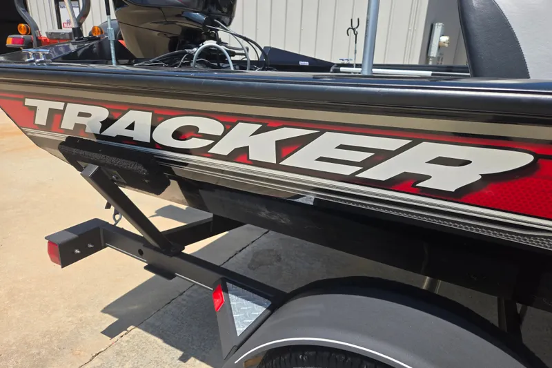 Slide: The Image of 2017 Tracker Pro Team 175 TXW boat with bold branding on trailer. - 23