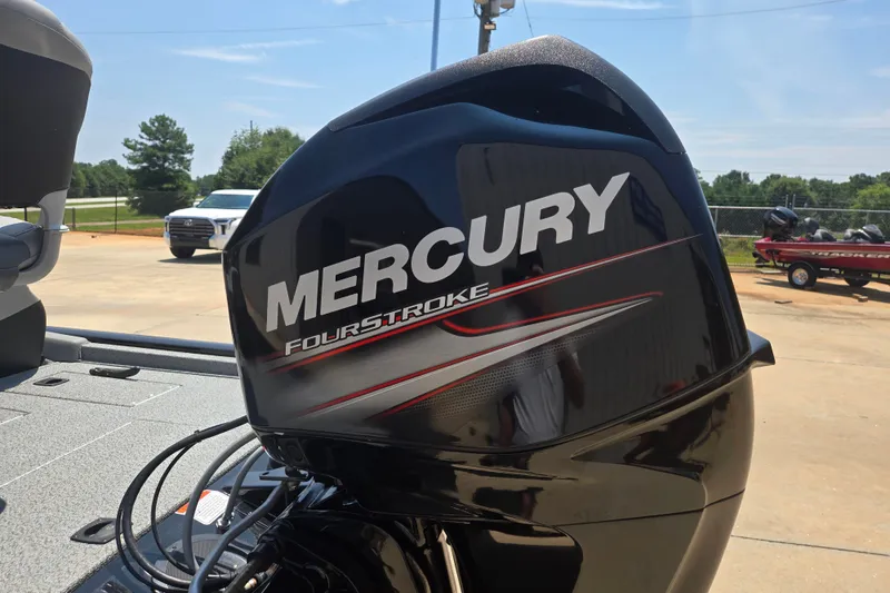 Slide: The Image of 2017 Tracker Pro Team 175 TXW with Mercury FourStroke engine in a sunny outdoor setting. - 17