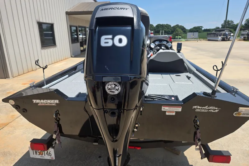 Slide: The Image of 2017 Tracker Pro Team 175 TXW boat with Mercury 60 engine, parked outdoors. - 18