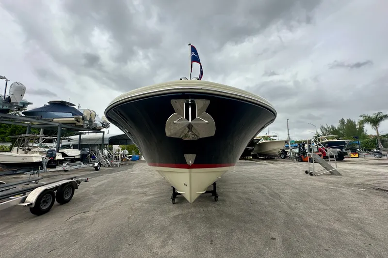 Slide: The Image of 2026 Chris-Craft Launch 35 GT boat on a trailer, overcast sky background. - 3