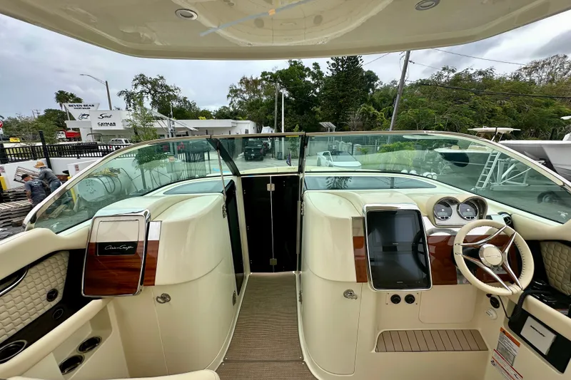 Slide: The Image of 2026 Chris-Craft Launch 35 GT boat interior with elegant dashboard and steering wheel. - 4