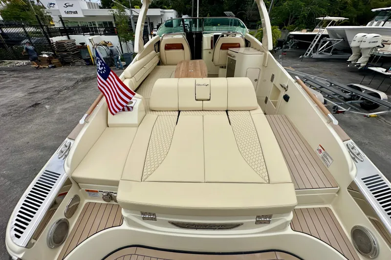 Slide: The Image of 2026 Chris-Craft Launch 35 GT boat with luxurious seating and American flag. - 20