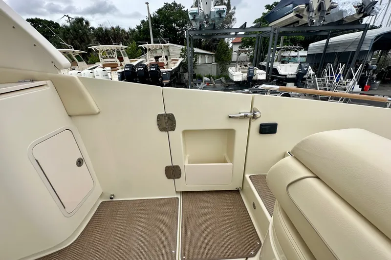 Slide: The Image of Interior view of 2026 Chris-Craft Launch 35 GT boat, showcasing seating and storage. - 19