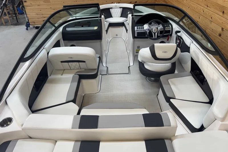 Slide: The Image of Luxurious interior of 2025 Regal 2000 ES boat with sleek seating and modern dashboard. - 6