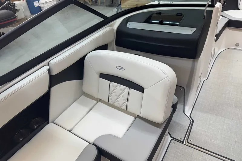 Slide: The Image of Interior of 2025 Regal 2000 ES boat, featuring sleek white seating and modern design. - 7