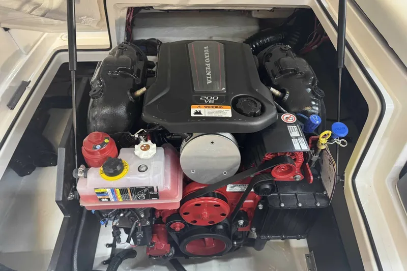 Slide: The Image of Engine compartment of a 2025 Regal 2000 ES boat with Volvo Penta V6 engine. - 11