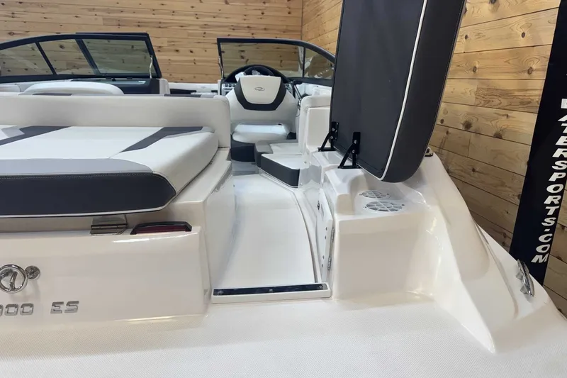 Slide: The Image of 2025 Regal 2000 ES boat interior with sleek seating and modern dashboard design. - 5