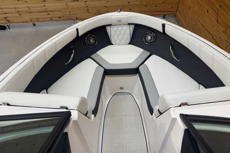 Slide: The Image of Interior of 2025 Regal 2000 ES boat with white and gray seating. - 10