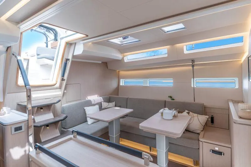 Slide: The Image of Manufacturer Provided Image: Luxurious interior of 2026 Jeanneau 55 yacht with modern seating and natural lighting. - 7