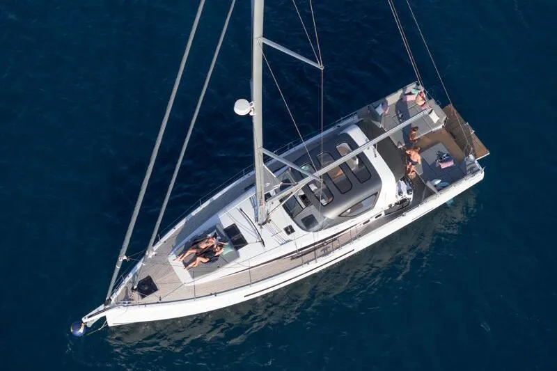 The Image of Manufacturer Provided Image: Aerial view of 2026 Jeanneau 55 yacht sailing on clear blue water. - 0