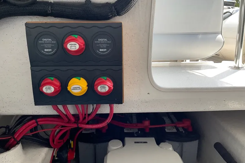 Slide: The Image of Electrical panel on a 2015 Protector 30 Center Console boat with battery switches. - 18