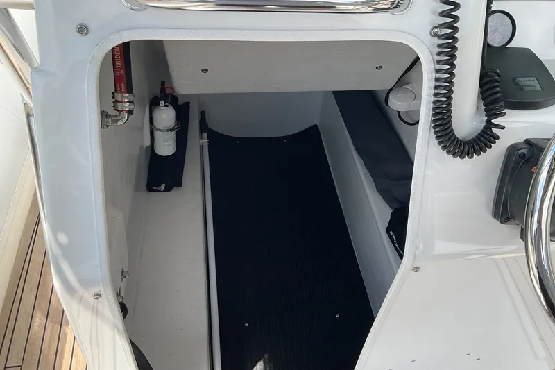 Slide: The Image of Interior view of a 2015 Protector 30 Center Console boat cabin with safety equipment. - 20