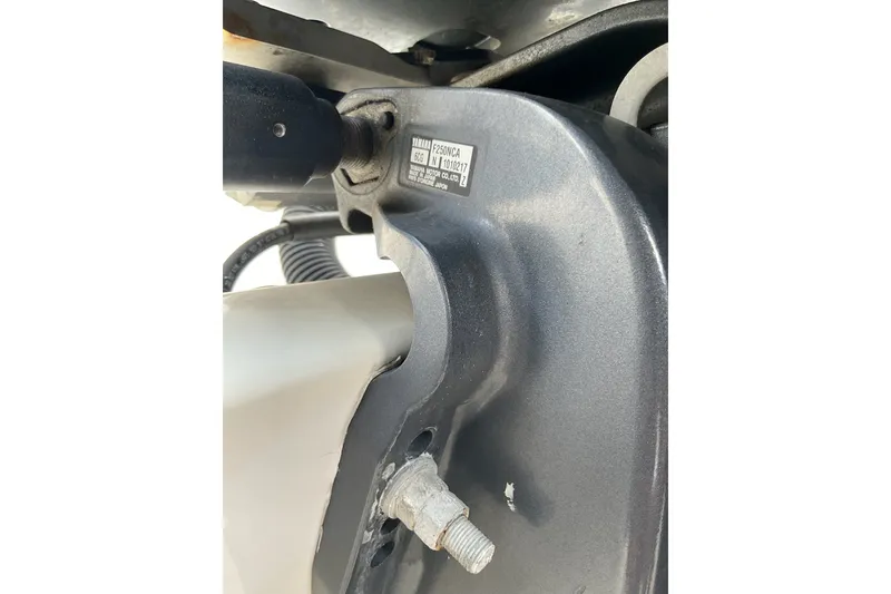 Slide: The Image of Close-up of a 2015 Protector 30 Center Console boat engine component. - 6