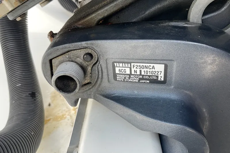 Slide: The Image of Close-up of Yamaha F250NCA engine part on 2015 Protector 30 Center Console boat. - 5
