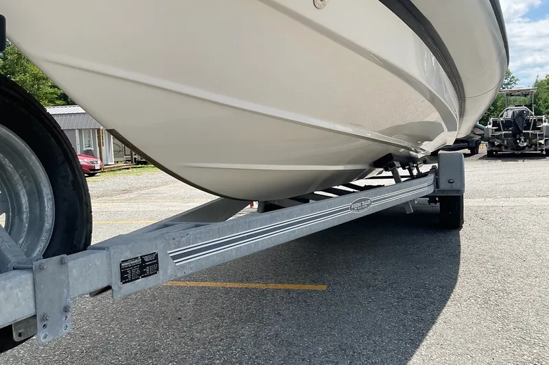 Slide: The Image of 2015 Protector 30 Center Console boat on trailer in parking lot. - 10