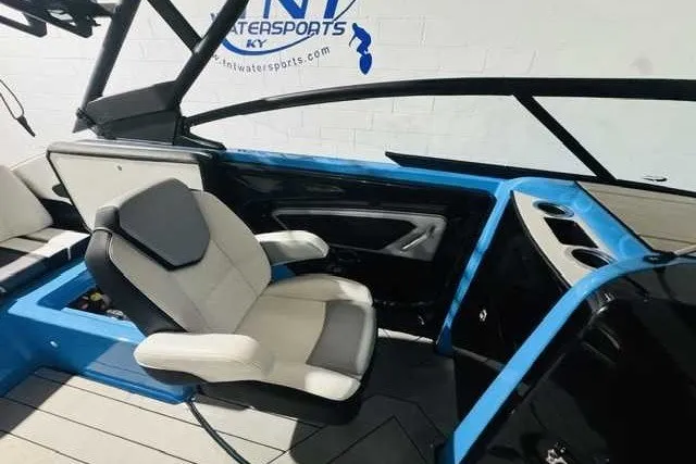 Slide: The Image of 2022 Yamaha Boats 255XD interior with modern seating and sleek design. - 6