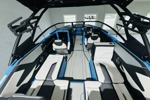 Slide: The Image of Interior of 2022 Yamaha Boats 255XD, featuring sleek seating and modern design elements. - 3