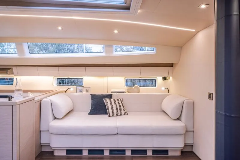 Slide: The Image of Manufacturer Provided Image: Luxurious interior of 2026 Jeanneau 65 yacht with elegant white sofa and modern design. - 8