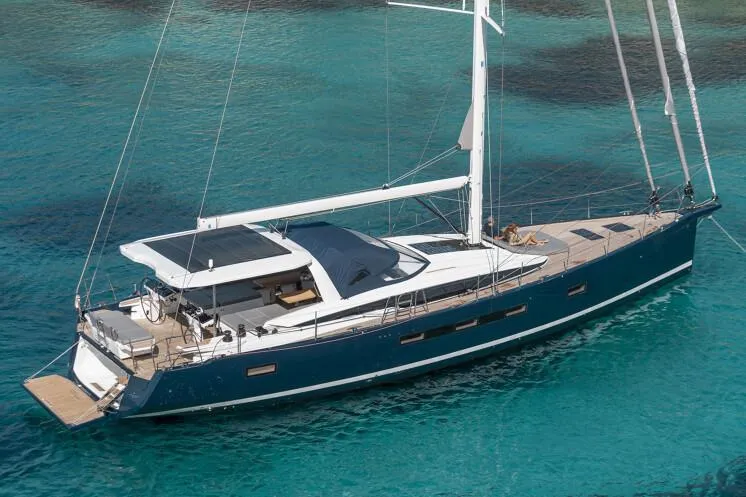 The Image of Manufacturer Provided Image: 2026 Jeanneau 65 yacht sailing on clear turquoise waters. - 0