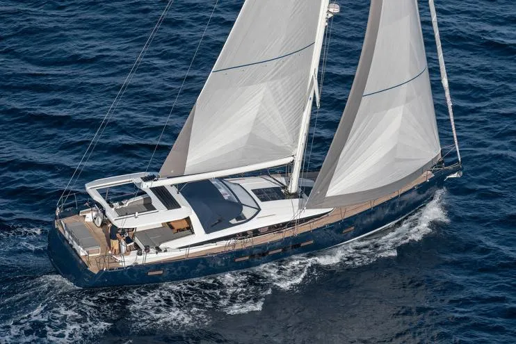 Slide: The Image of Manufacturer Provided Image: 2026 Jeanneau 65 sailing yacht cruising on open sea with full sails. - 2