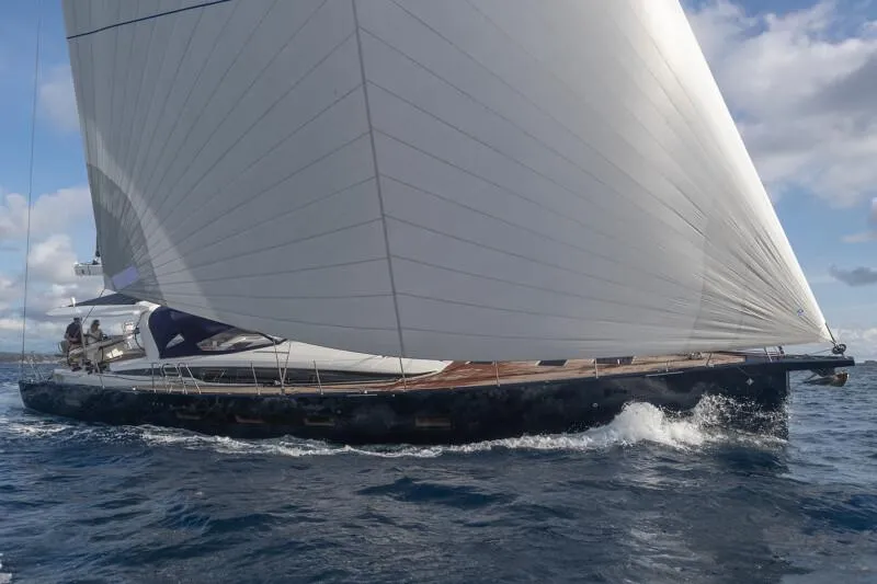 Slide: The Image of Manufacturer Provided Image: 2026 Jeanneau 65 sailing yacht gliding on open sea under full sail. - 1