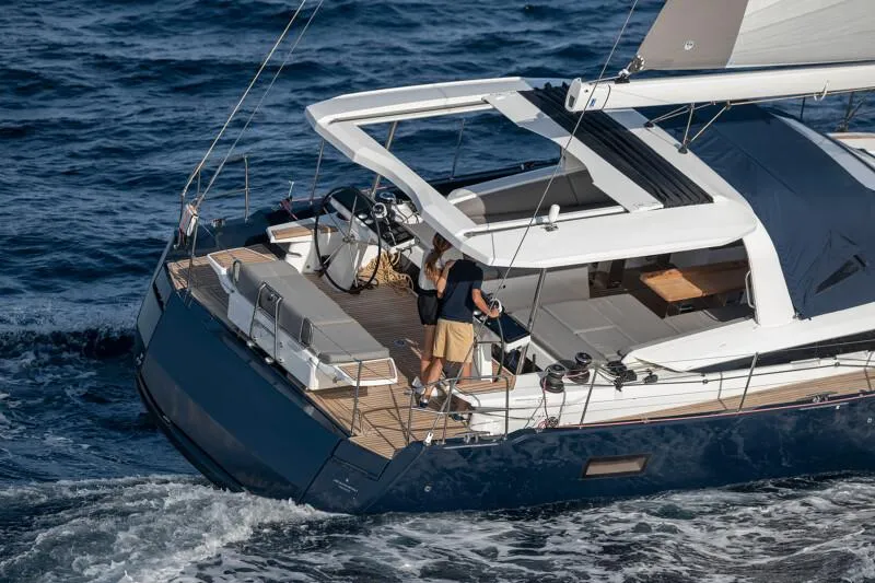 Slide: The Image of Manufacturer Provided Image: 2026 Jeanneau 65 yacht sailing on open sea, featuring sleek design and spacious deck. - 3