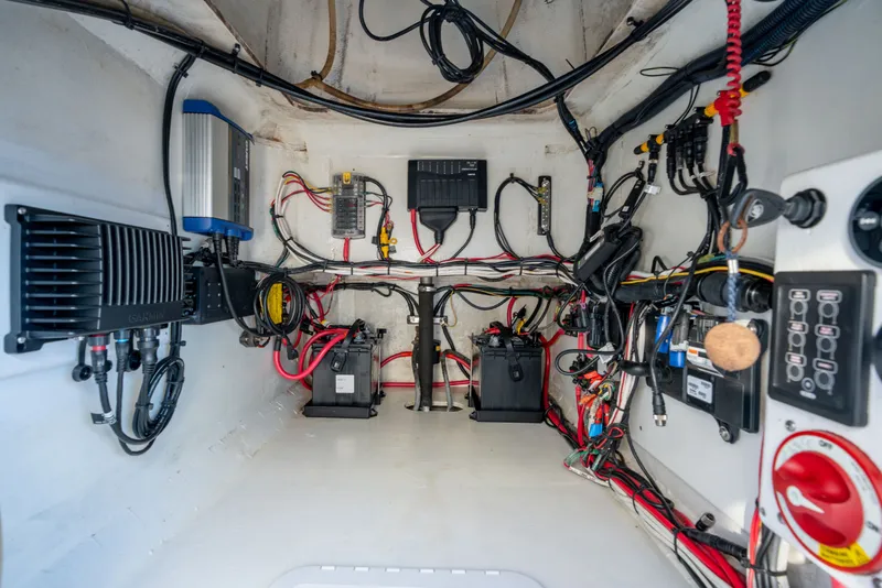 Slide: The Image of Electrical wiring and components inside a 2021 Harrison Boatworks 23 Center Console boat. - 18