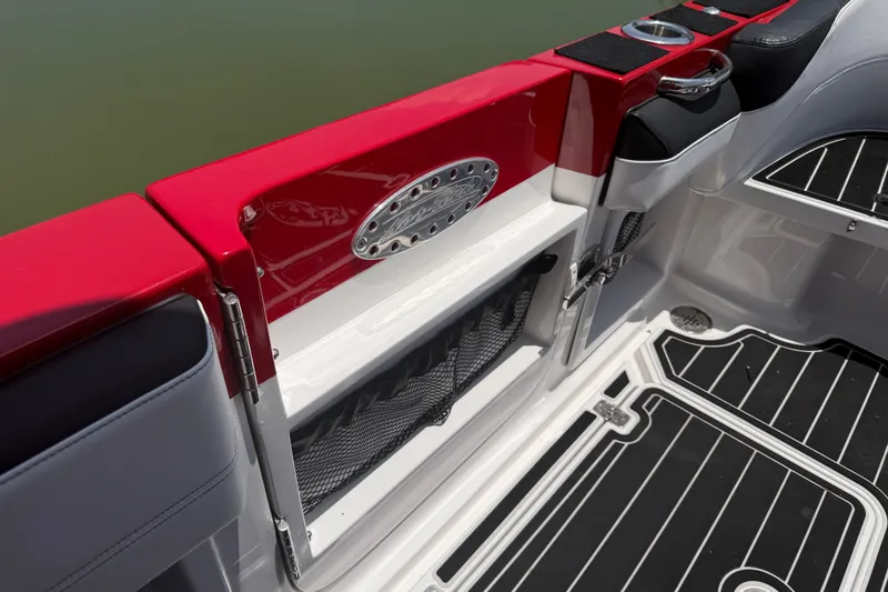 Slide: The Image of 2024 Nor-Tech 390 Sport boat interior with red accents and sleek black flooring. - 20