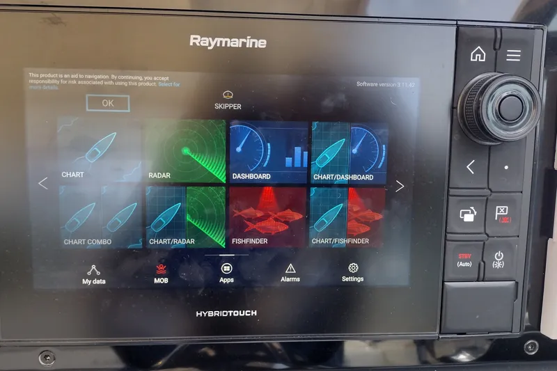 Slide: The Image of Raymarine navigation system on 2026 Formula 350 Crossover Bowrider, displaying charts and radar. - 66