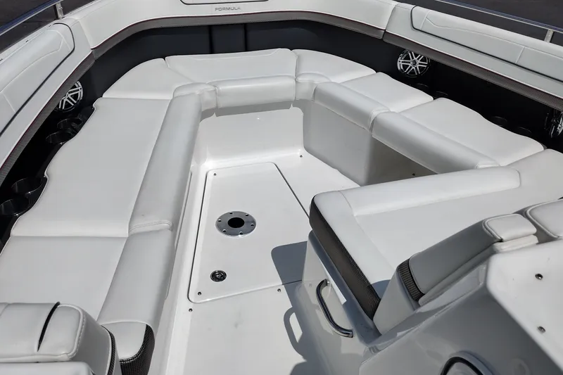 Slide: The Image of 2026 Formula 350 Crossover Bowrider interior with spacious white seating and cup holders. - 17