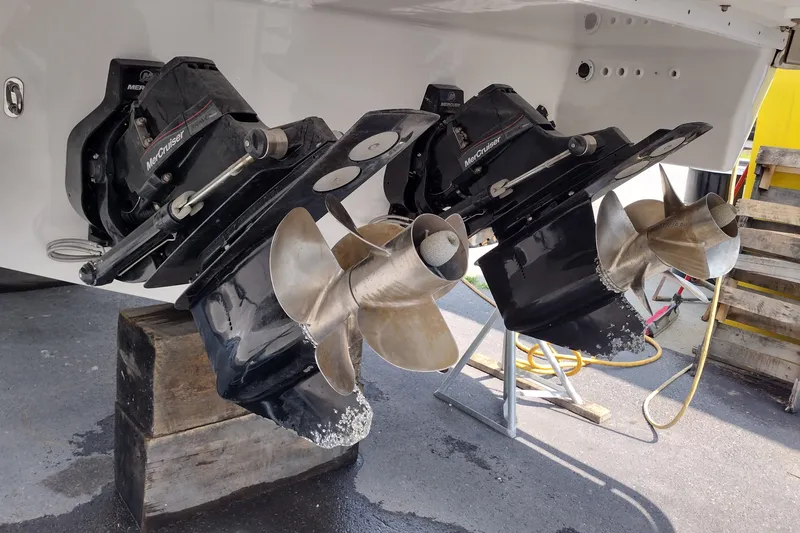 Slide: The Image of Dual MerCruiser outdrives on a 2026 Formula 350 Crossover Bowrider, showcasing propellers. - 12