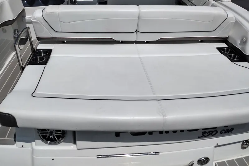 Slide: The Image of 2026 Formula 350 Crossover Bowrider boat with spacious seating and cup holders. - 15