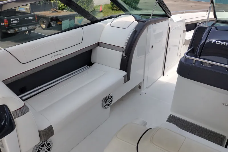 Slide: The Image of 2026 Formula 350 Crossover Bowrider interior with sleek seating and modern design. - 23